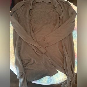 Large green open cardigan